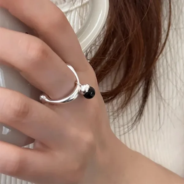 minimalist silver color ring with black pendant