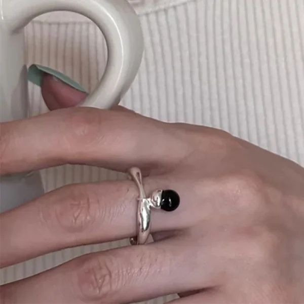 minimalist silver color ring with black pendant