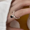 minimalist silver color ring with black pendant