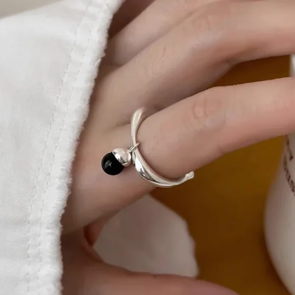 minimalist silver color ring with black pendant