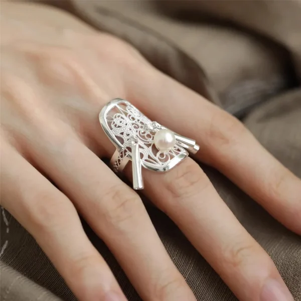 hollow flower butterfly pearl tassel ring