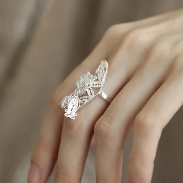 hollow flower butterfly pearl tassel ring