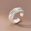 silver color scrub lines crossed geometric cuff ring