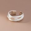 silver color scrub lines crossed geometric cuff ring