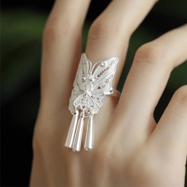 hollow flower butterfly pearl tassel ring